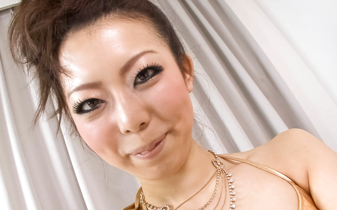 Naughty Yuki Asami with hot ass up licks dildo