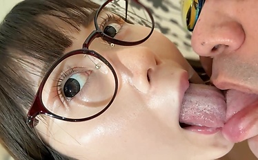 Asian beauty shares a passionate kiss in this intimate encounter